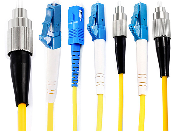 How are fiber jumpers classified?